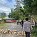 Respon Cepat Polres Tolikara Mediasi Pembukaan Palang Jalan